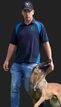 Paul Grant walking with his Belgian Malinois